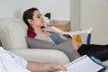 Hypnosis being practiced on a female patient Royalty Free Stock Photo