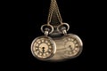 Hypnosis session. Vintage pocket watch with chain swinging on black background, motion effect Royalty Free Stock Photo