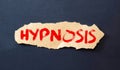 Hypnosis word appearing behind torn brown paper. Reduce stress psychological healthcare concept