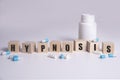 HYPNOSIS word made with building blocks with pills