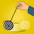 Hypnotizer pendulum in hand pop art vector Royalty Free Stock Photo