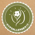 Hypoallergenic green label, badge with leaves and flower for allergy safe products, isolated object