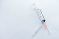 Hypodermic needleinjection needle on white background. Royalty Free Stock Photo