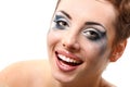 Hysterics crying and smiling woman with wet makeup over white Royalty Free Stock Photo