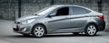 Hyundai accent in grey color 2014, left side view