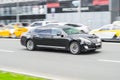 Hyundai Equus Centennial on the street in motion. Front side view of a premium Korean car, luxury black limousine Royalty Free Stock Photo