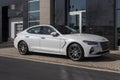 Hyundai Genesis G70 Luxury Sport Sedan display at a dealership. The Genesis G70 features a turbocharged engine