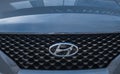 Hyundai Logo Close-up On Car Bumper Or Grill. Hyundai Automobile Manufacturer