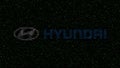 Hyundai Motor Company logo made of hexadecimal symbols on computer screen. Editorial 3D rendering