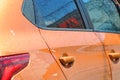 Wet Hyundai Solaris 1.6 Orange in Russia. Royalty Free Stock Photo