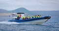 Tourists on speedboat during starting whale watching tour from HÃÂºsavik