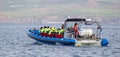 Tourists on speedboat during starting whale watching tour from HÃÂºsavik