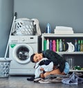 I absolutely love clean linens. Full length portrait of an attractive young woman clutching a pile of freshly washed