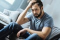 Cheerless moody man being alone Royalty Free Stock Photo