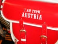 I am from austria text on red white travel leather motorcycle side bag for retro motorbike Royalty Free Stock Photo