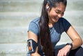 I beat my best. Shot of a young woman checking her watch while out exercising. Royalty Free Stock Photo