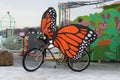 Bicycle with Large Monarch Butterfly Wings Attached