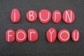 I burn for you, passion message of passion with red colored stones Royalty Free Stock Photo