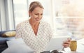 I can do anything from the comfort of my home. a mature businesswoman working from her home office. Royalty Free Stock Photo