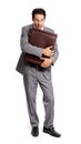 I cannot lose these documents. Full-length shot of a young executive clutching his briefcase to his chest. Royalty Free Stock Photo