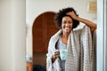 I cant believe the weekend is finally here. Portrait of a happy young woman drinking a cup of coffee in the morning at Royalty Free Stock Photo