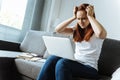 Cheerless young woman being tired from studying Royalty Free Stock Photo