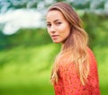 I cant think of a better way to spend the day. Cropped portrait of a young woman standing in the outdoors.