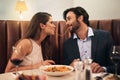 I cant wait to get to the middle. a young couple sharing spaghetti during a romantic dinner at a restaurant. Royalty Free Stock Photo