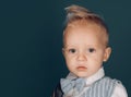 I care about my hair. Small child with messy top haircut. Small boy with stylish haircut. Boy child with stylish blond Royalty Free Stock Photo