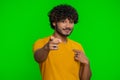 Happy excited young indian man pointing to camera, making good choice, showing direction, choose you Royalty Free Stock Photo