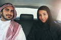 I chose the perfect partner to travel through life with. Portrait of a young arabic couple traveling in a luxury car. Royalty Free Stock Photo