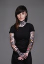 I collect memories on my skin. A cropped studio portrait of a beautiful tattooed young woman.