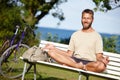 I come here to meditate. a mature man meditating on a park bench. Royalty Free Stock Photo