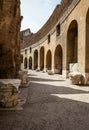 I curved corridor inside the ruins of the Roman colosseum with sunlight Royalty Free Stock Photo