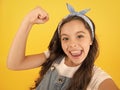 I did it. Happy little girl flex biceps on yellow background. Girls power. Girls rule the world. Future is female