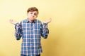 I don`t know. clueless boy lifts hands in dismay Royalty Free Stock Photo