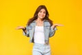 I don`t know. Portrait of confused beautiful brunette young woman with makeup in denim casual style standing with raised arms and