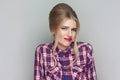 I dont know. confused beautiful girl with pink checkered shirt, Royalty Free Stock Photo