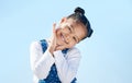 I dont like photos. a little girl looking shy while standing outside. Royalty Free Stock Photo