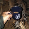 I drank a cup of coffee at the traditional wood fire in the forest Royalty Free Stock Photo