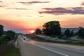 I94 expressway traffic in Ann Arbor, Michigan, USA during sunset