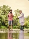 I feel as young as I ever did. retired businessman. friendship. granddad and drandson fishing. hobby and recreation Royalty Free Stock Photo