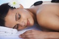 I feel revitalised. A beautiful woman receiving a hot stone massage. Royalty Free Stock Photo