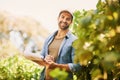 I find happiness in my work. Portrait of a cheerful young farmer posing in the fields on his farm. Royalty Free Stock Photo