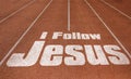 I Follow Jesus written on running track, New Concept on running track text in white color