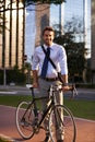 I go everywhere by bike. a businessman commuting to work with his bicycle. Royalty Free Stock Photo