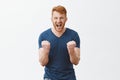 I am going kill you bastard. Portrait of outraged angry and mature bearded redhead strong man, clenching fists