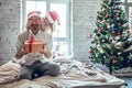 I got a present for you. Daughter giving her father a surprise present Royalty Free Stock Photo