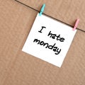 I hate monday. Note is written on a white sticker that hangs wit Royalty Free Stock Photo