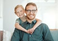 I have the best dad in the world. Shot of an adorable little girl hugging her father during a day at home. Royalty Free Stock Photo